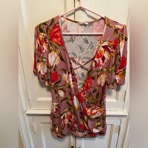 Womens sz S (will fit medium and large !) faux wrap shirt w floral pattern
